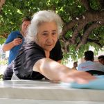 4375832946_c879443a62_old-greek-lady-with-umbrella