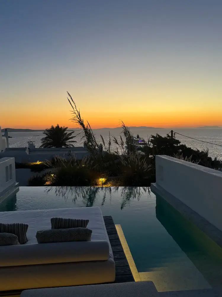 Sunset on Mykonos from private pool at Deos Hotel. Image by Rebecca Hall.